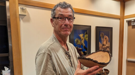 Jon Bishop turned a pear bowl with natural edge