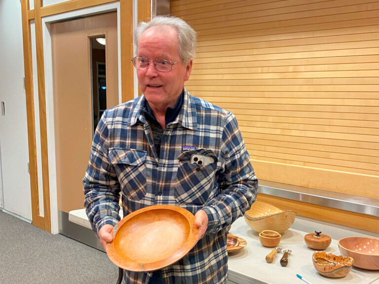 Dennis shows his platter with stone inlay.