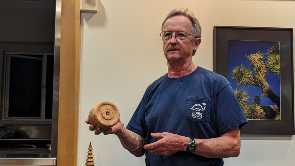 Tom Gaston shows one of his lidded boxes